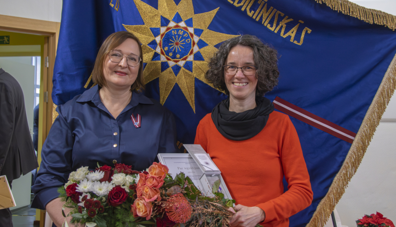 Andreta Līvena ar NMPD vadītāju Lieni Cipuli